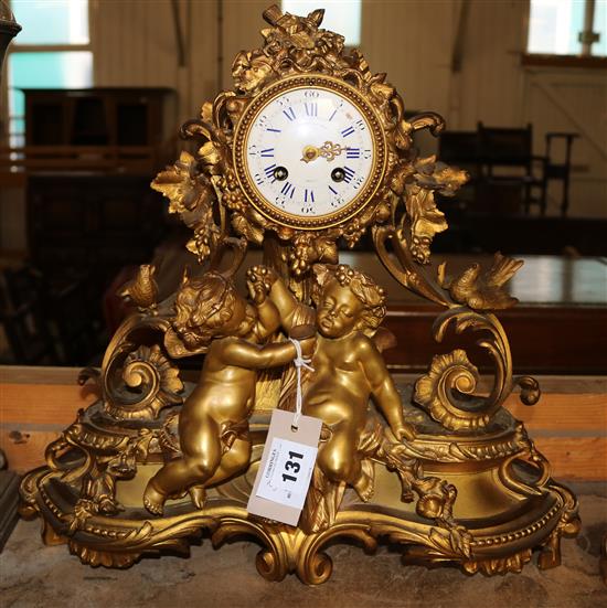 A Louis XV style gilt metal eight day mantel clock by Marshall & Sons, Paris(-)
